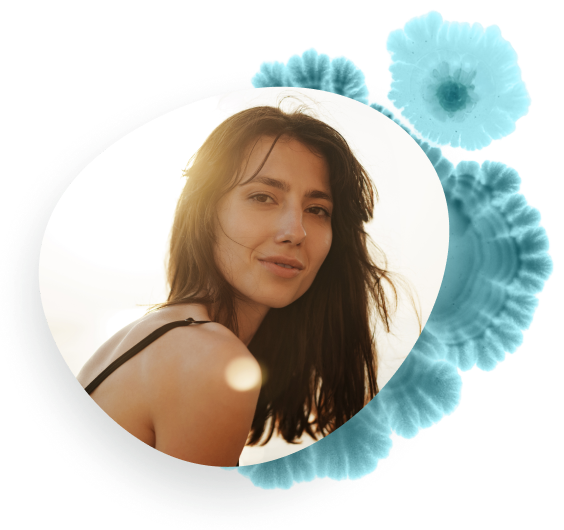 Young women looking peaceful in sunlight.